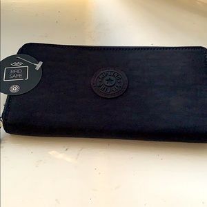 Kipling live light wallet NWT